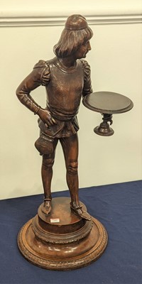 Lot 185 - A carved walnut figure of a young man shown in...