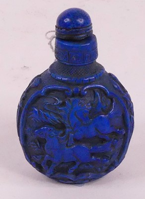 Lot 289 - A Chinese carved blue resin snuff bottle, h.8.5cm