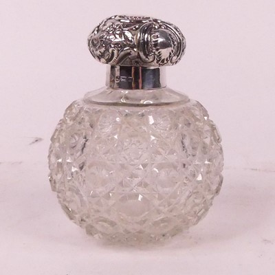 Lot 301 - A Victorian silver lidded cut glass scent...