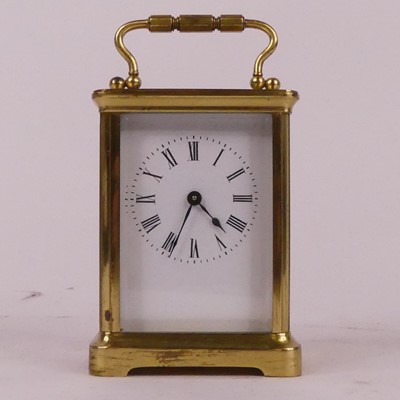 Lot 302 - A lacquered brass carriage clock, the...