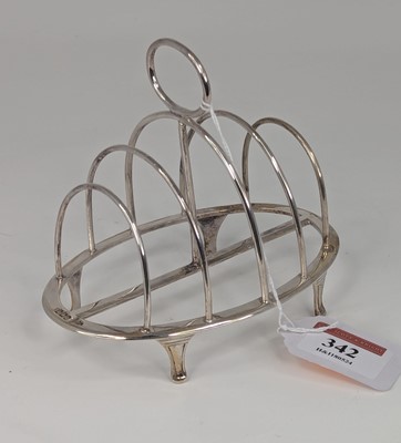 Lot 342 - A George V silver toast rack having four...