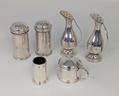 Lot 350 - A pair of continental white metal pepperettes,...