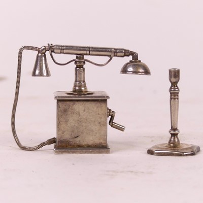 Lot 315 - A miniature silver model of a vintage...