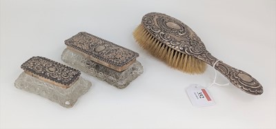 Lot 352 - A Victorian silver backed hairbrush having a...