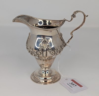 Lot 357 - A Victorian silver cream jug, having a beaded...