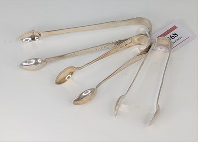 Lot 368 - A pair of 19th century white metal sugar tongs...