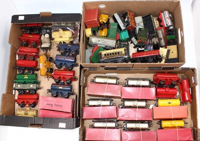 Lot 255 - Three trays containing Hornby wagons from all...