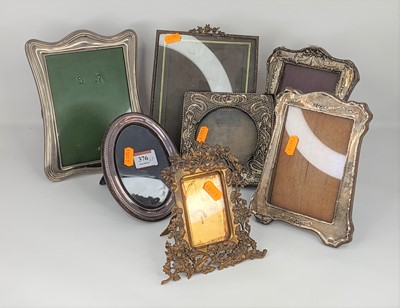 Lot 376 - An Art Nouveau silver clad easel photo frame...