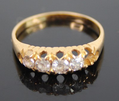 Lot 397 - An 18ct gold diamond half hoop ring, arranged...