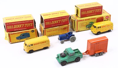 Lot 563 - Four Dublo-Dinky Toys: 069 Massey-Harris...