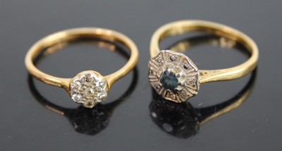 Lot 432 - An 18ct gold diamond flower head cluster ring,...