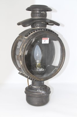 Lot 87 - A table lamp in the form of a coach lamp,...