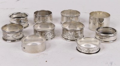 Lot 320 - A collection of ten silver napkin rings, 5.5ozt