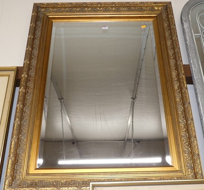 Lot 1016 - A gilt framed and bevelled rectangular wall...