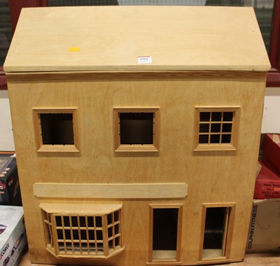 Lot 1511 - A wooden homemade open front dolls house with...