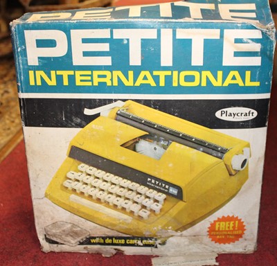 Lot 1601 - A Playcraft Petite International typewriter...