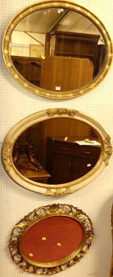 Lot 1164 - An early 20th century gilt framed oval wall...