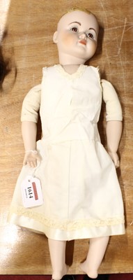 Lot 1614 - A vintage headed and jointed collectable doll...