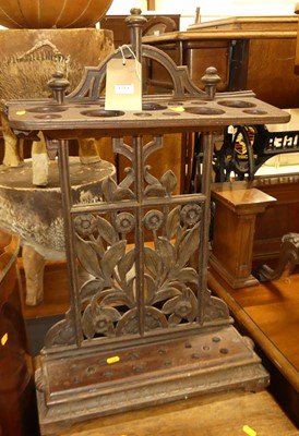 Lot 1214 - A cast metal and timber divisional stick stand,...