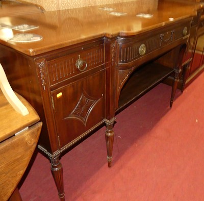 Lot 1233 - An early 20th century mahogany breakfront...