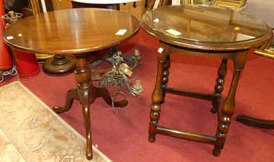 Lot 1249 - A contemporary mahogany circular fixed top...