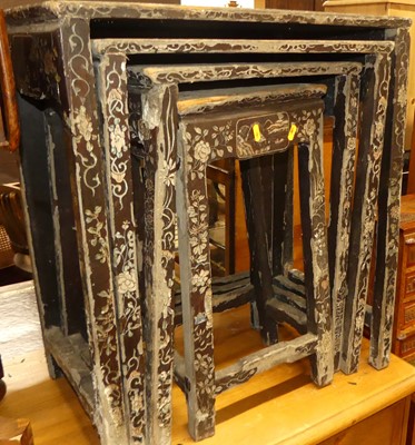 Lot 1261 - An Oriental black painted quartetto nest of...