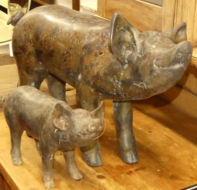 Lot 1274 - A contemporary metal model of a standing sow,...