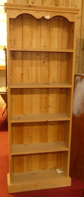 Lot 1280 - A modern pine freestanding open bookshelf,...