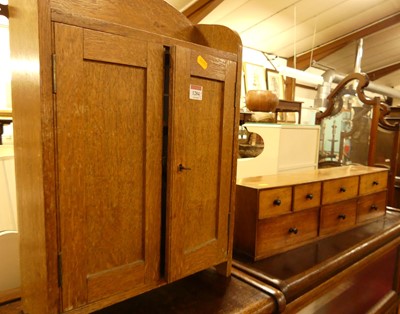 Lot 1284 - An early 20th century oak double door...