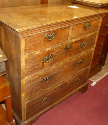 Lot 1294 - A George III oak squarefront chest of two...