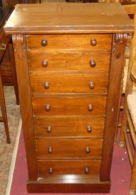 Lot 1296 - A Victorian walnut Wellington chest, having...