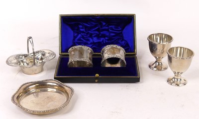 Lot 475 - A pair of Victorian silver napkin rings, each...