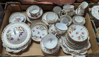 Lot 489 - A collection of Dresden floral decorated tea...