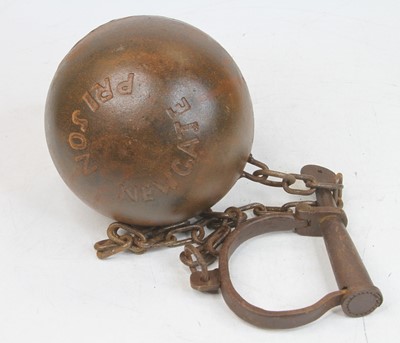 Lot 534 - A reproduction metal ball and chain