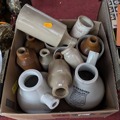 Lot 511 - A collection of stoneware jars and bottles