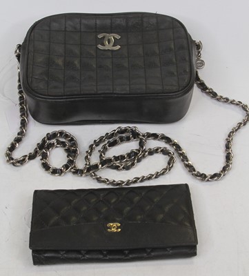 Lot 543 - After Chanel - a lady's quilted handbag, with...