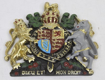 Lot 544 - A painted composite plaque of the Royal Coat...