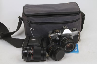 Lot 547 - A Praktica NTL5 film camera; together with...