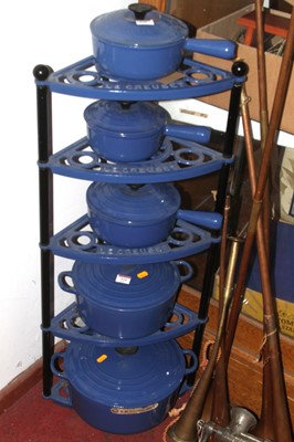 Lot 576 - A graduated set of five Le Creuset blue cast...