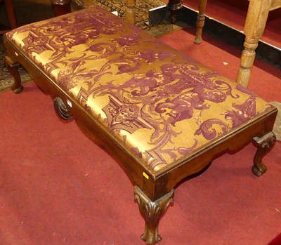 Lot 1304 - A mahogany long foot stool in the Georgian...