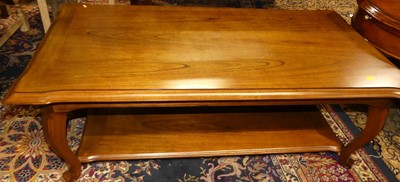 Lot 1306 - A contemporary cherry wood oval coffee table,...