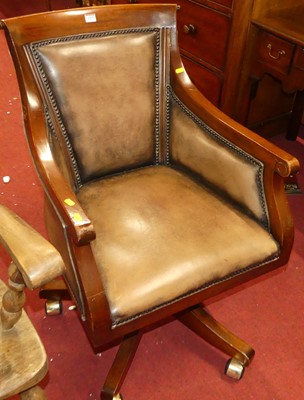 Lot 1355 - A contemporary mahogany tan leather and...