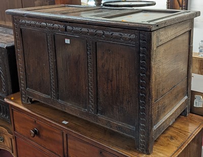 Lot 1359 - An 18th century joined oak three-panelled...