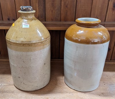 Lot 1369 - Two glazed stoneware storage jars, the larger...