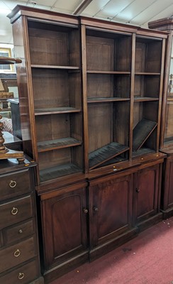 Lot 1372 - A Victorian mahogany breakfront bookcase, the...