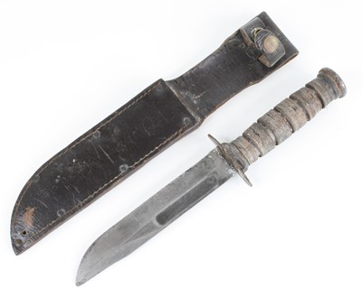 Lot 3323 - A U.S. Ka-Bar fighting knife, the 17.5cm blade...