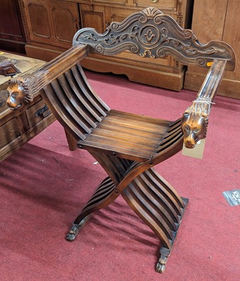 Lot 1380 - A contemporary Spanish stained beech X-frame...