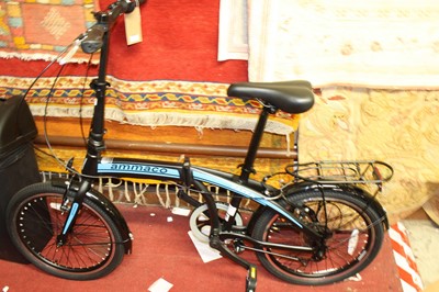 Lot 1381 - An Ammaco Pakka foldable portable bicycle...