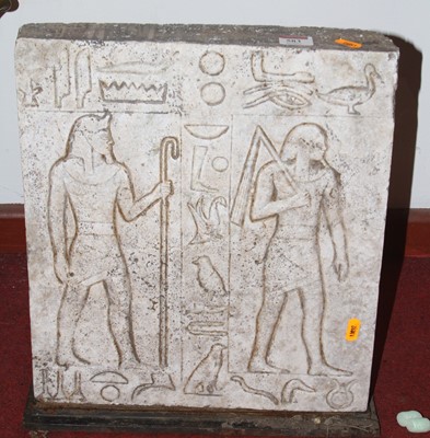 Lot 583 - An ancient Egyptian style relief carved stone...