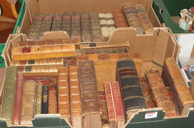 Lot 600 - A collection of antique leather bound books,...